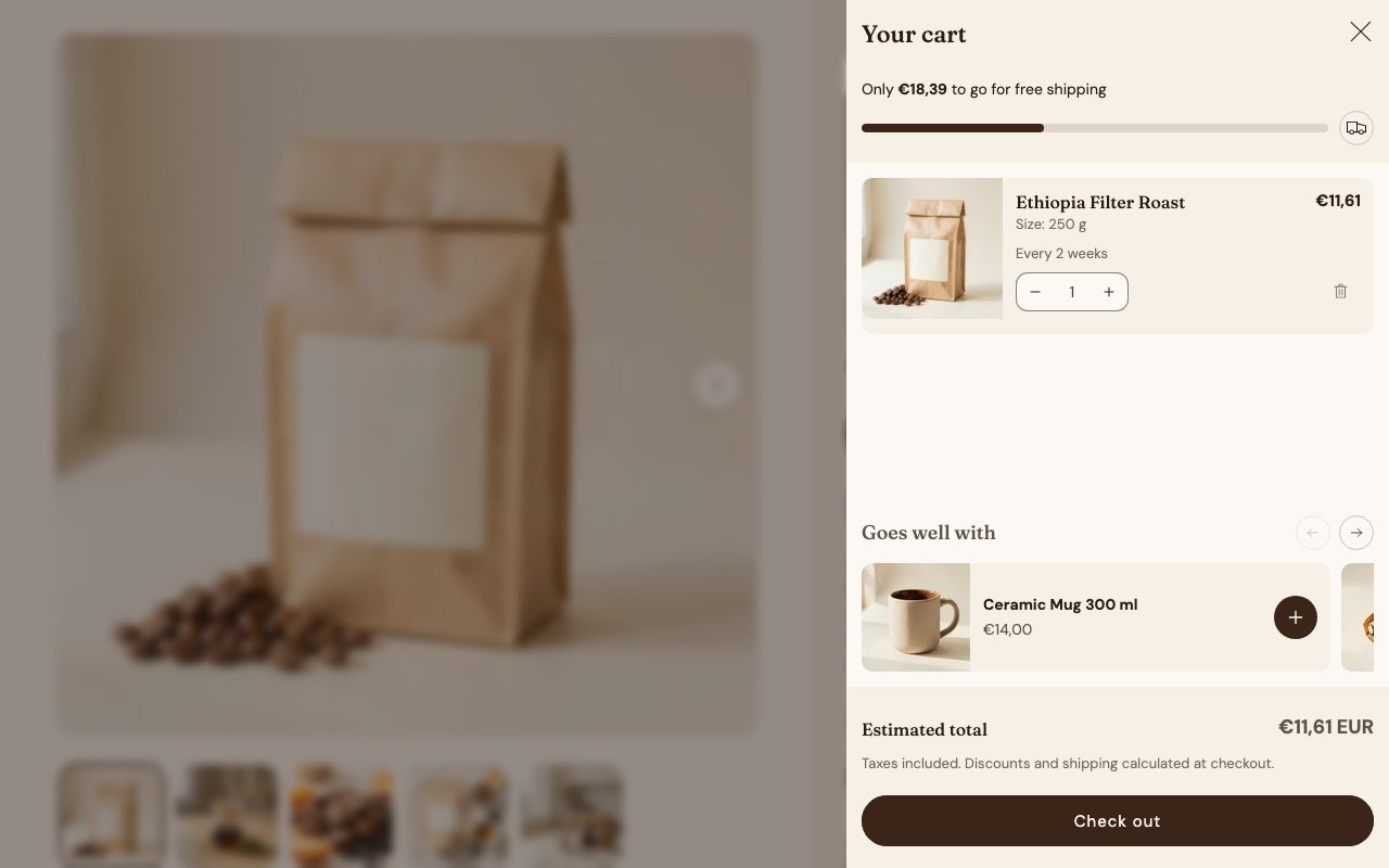 The drawer after adding a coffee: the bar shows how much is left to free shipping